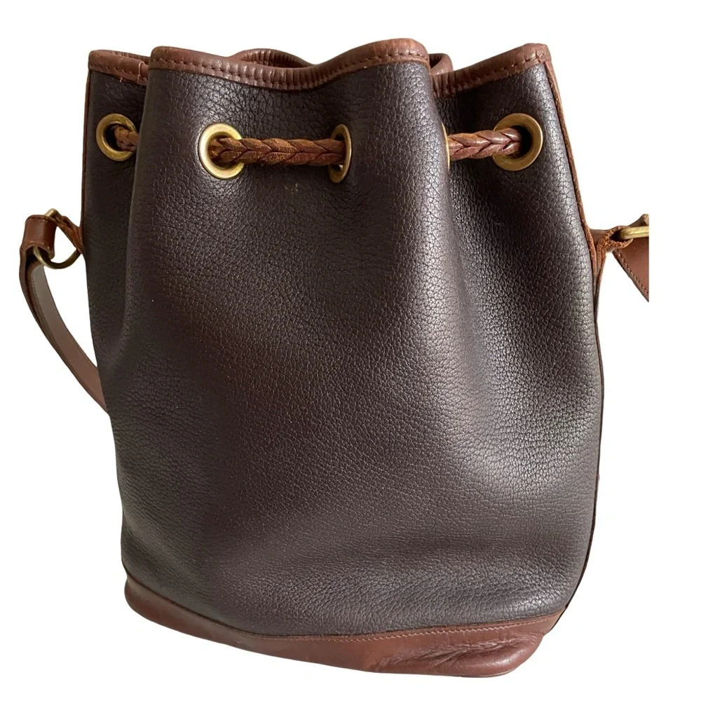 Dooney & Bourke Vintage Brown Leather Bucket Bag w/Tassel Drawstring Crossbody